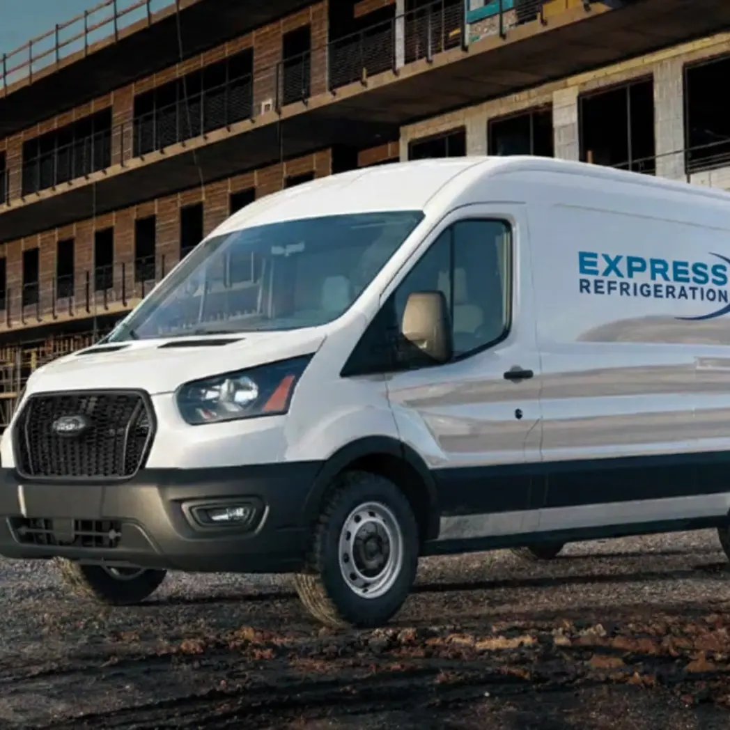 branded service van parked at Calgary commercial job site, representing trusted local experts in commercial refrigeration and HVAC services
